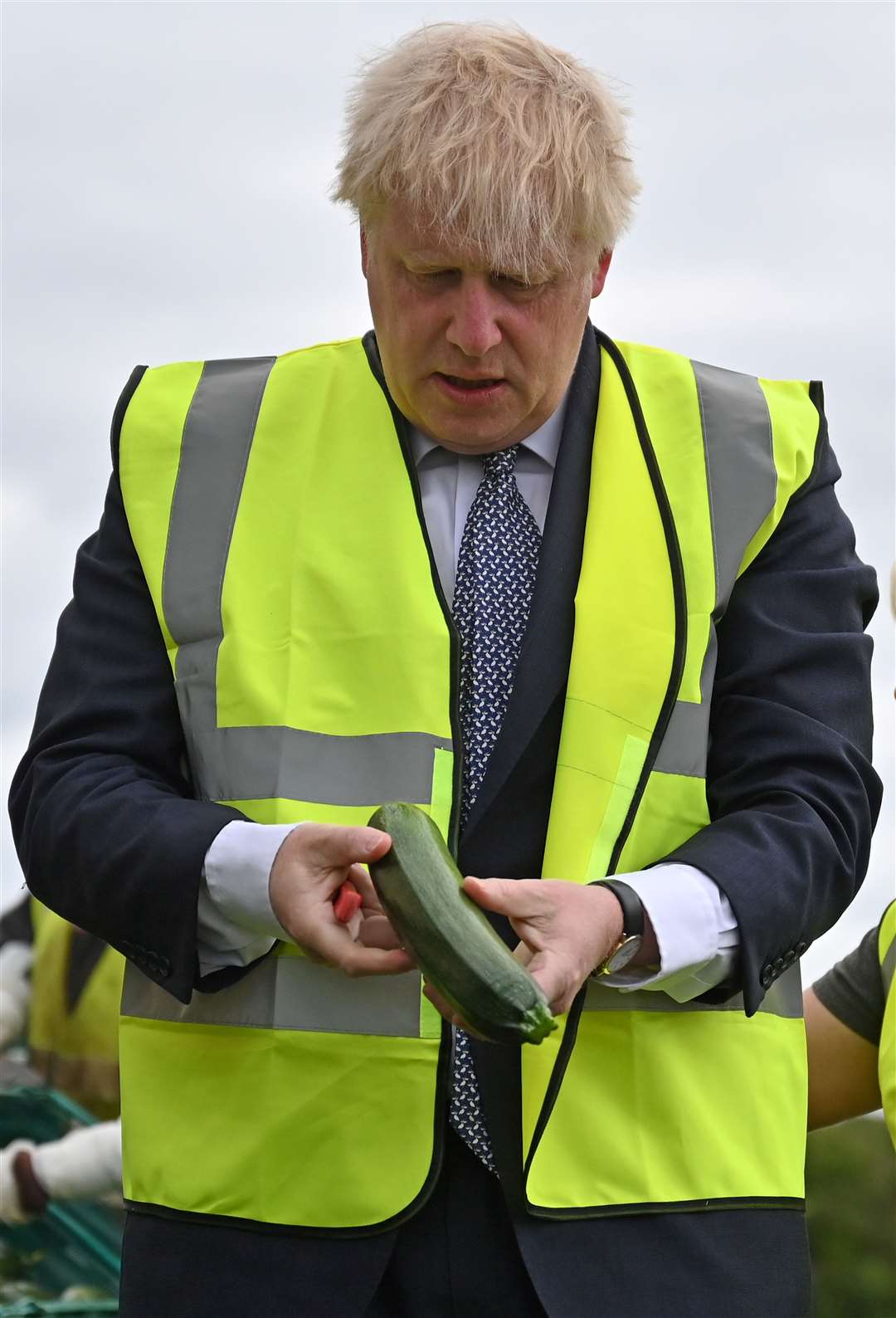The Prime Minister inspects a courgette (Justin Tallis/PA)