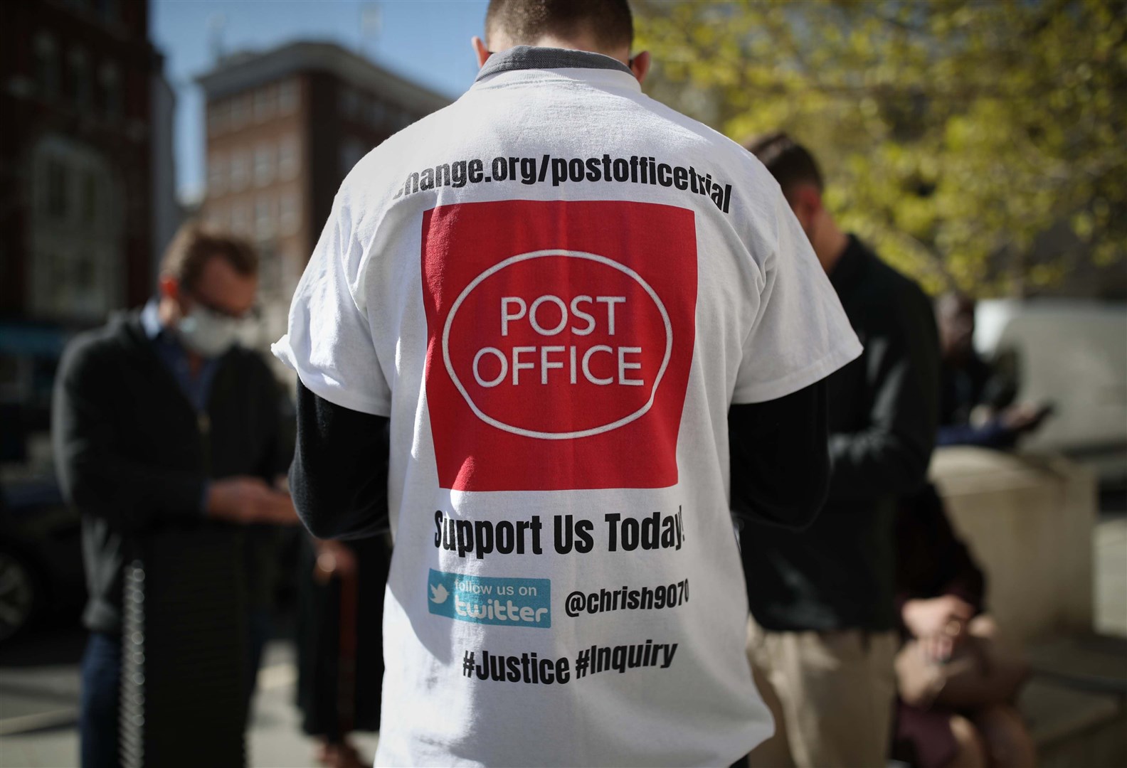 Protesters outside the Royal Courts of Justice (Yui Mok/PA)