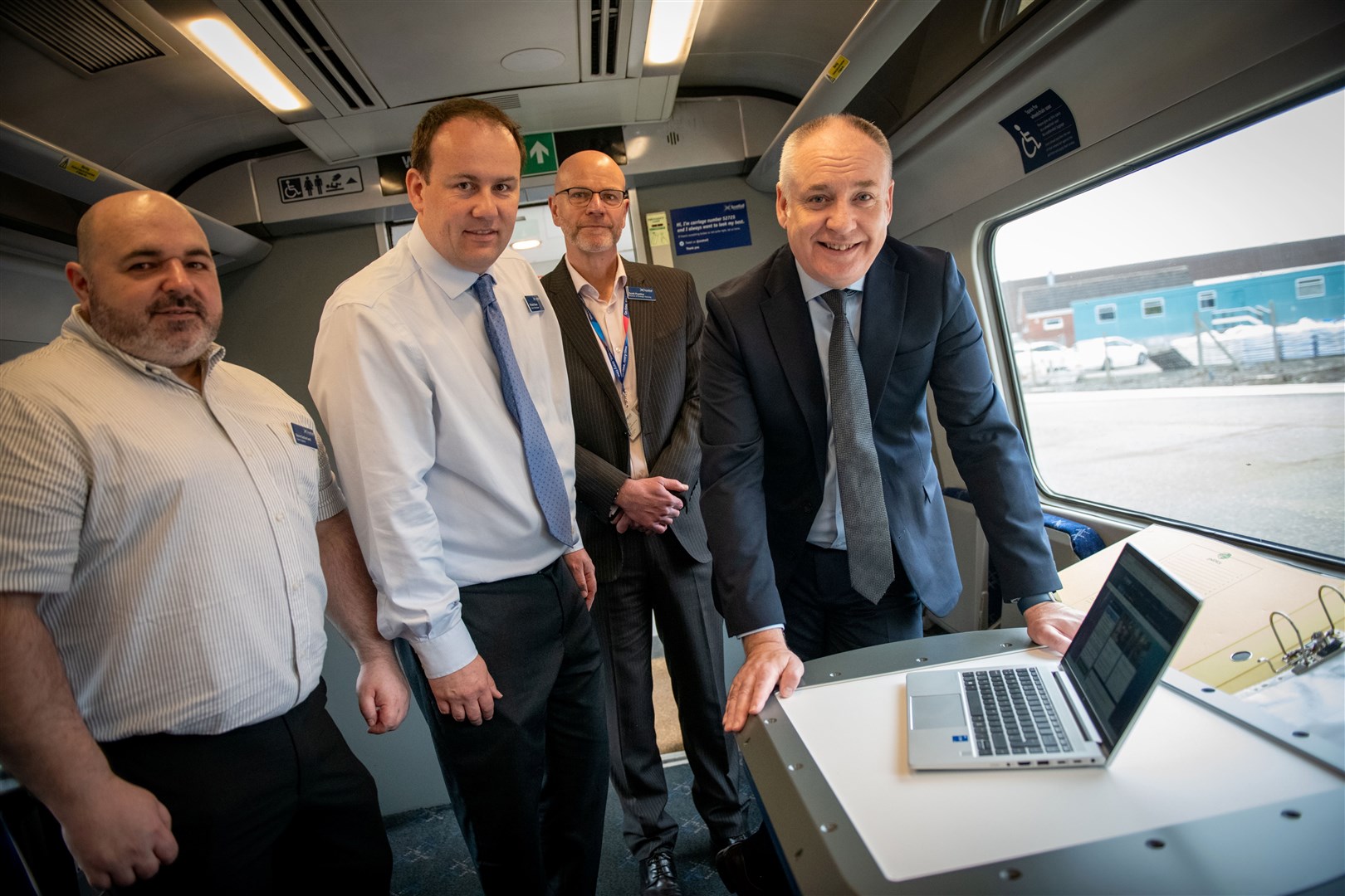 Pictured left to right: Steve Sutherland, Fleet Engineer ScotRail; Richard Brown, Senior Fleet Engineer ScotRail; Scott Prentice, Director of Strategic Planning and business minister Richard Lochhead. Picture: Callum Mackay.