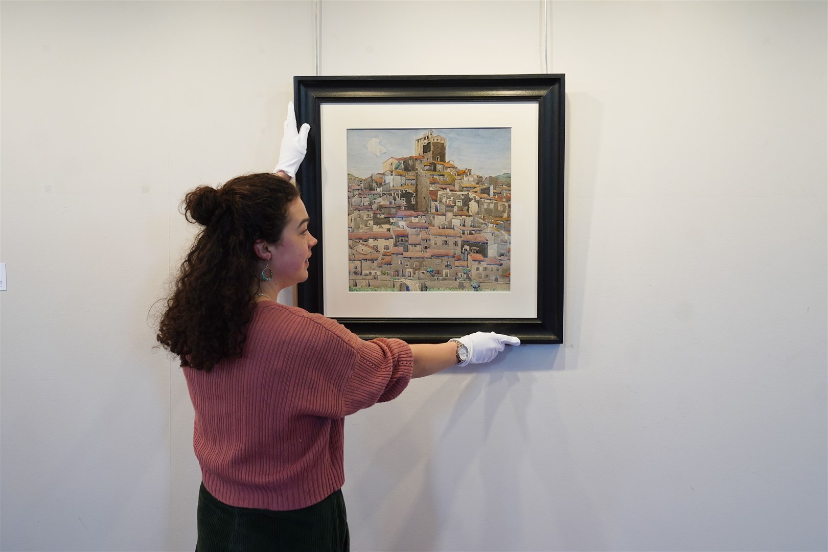 Associate specialist Ursula Goldsmith with the Bouleternere watercolour (Stewart Attwood/Lyon & Turnbull/PA)