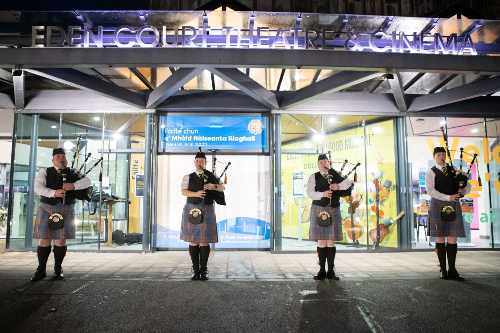 Members of City of Inverness Pipe Band warmly welcome live audiences to Eden Court Theatre for the opening night of The Royal National Mòd 2021 in Inverness