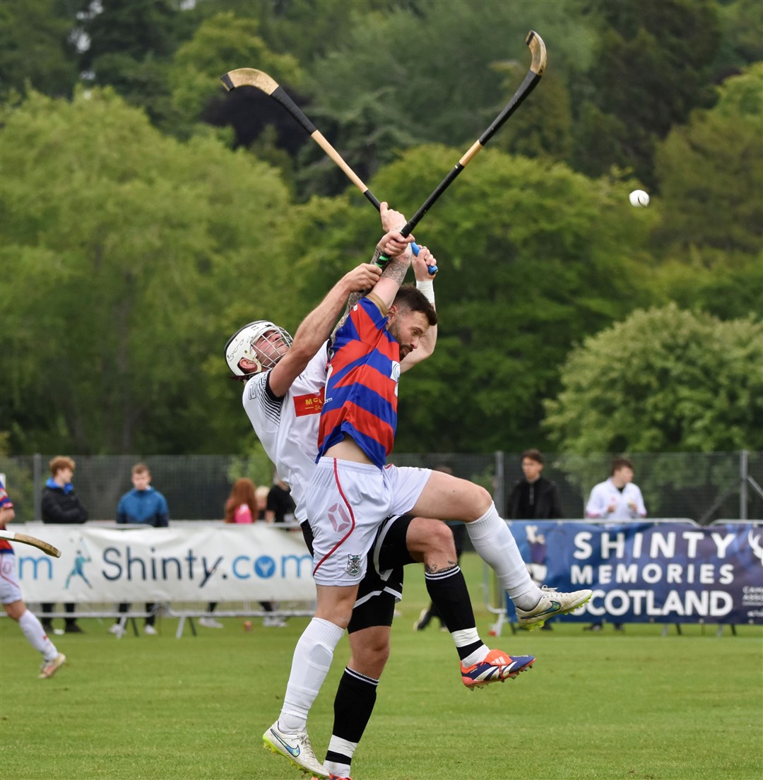 Kings skipper Tuck Borthwick and Lovat's Danny Kelly leap for the ball.