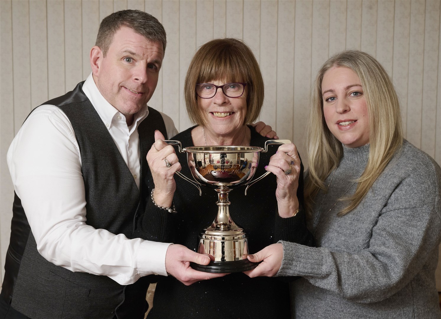 Ker Bet and Gemma McAllister with the memorial trophy.