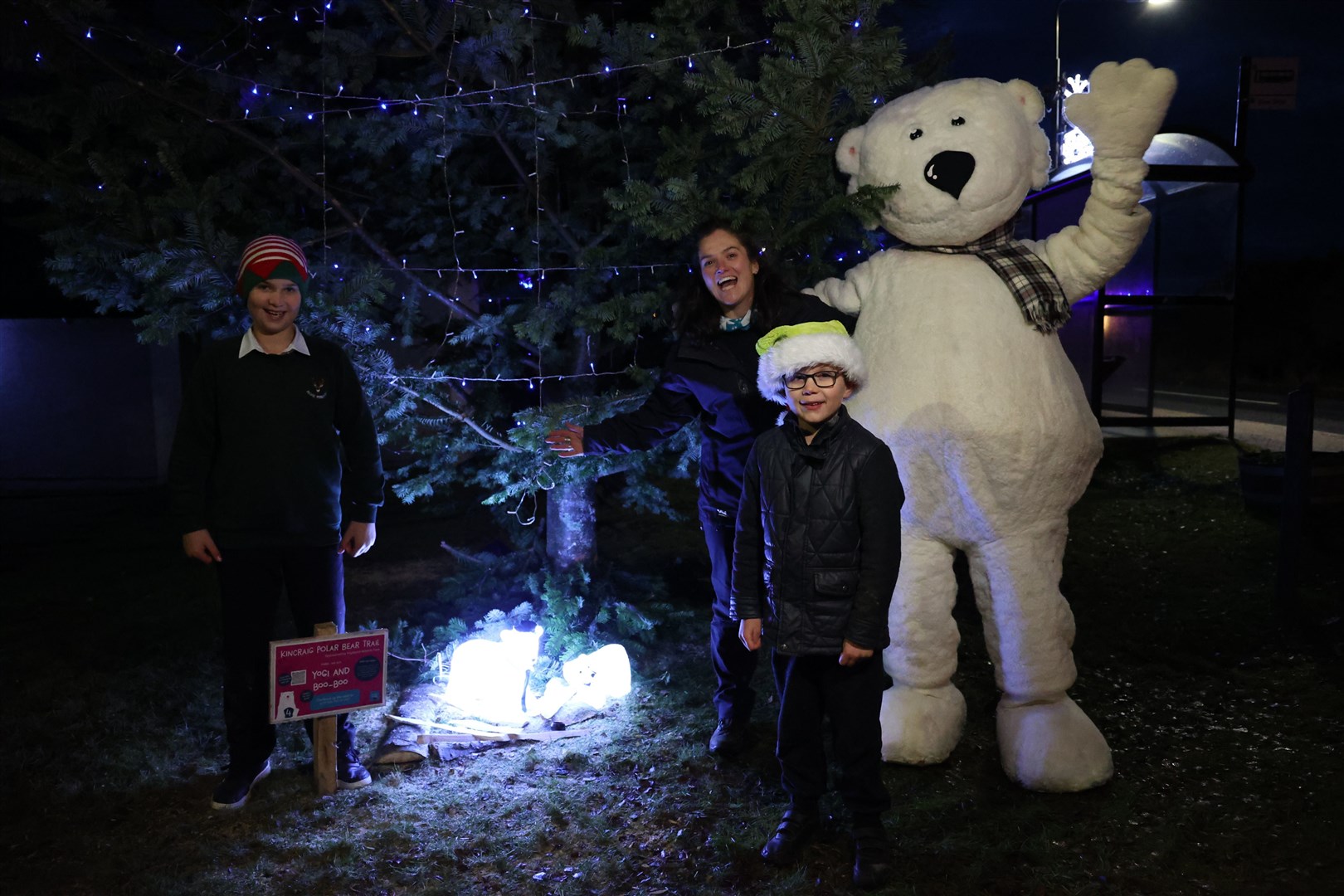 On the trail: Brodie and Jess Wise, the Highland Wildlife Park's learning and discovery programme manager, greeted earlier 'huntsmen' Logan and Max Hambling this week. (RZSS)