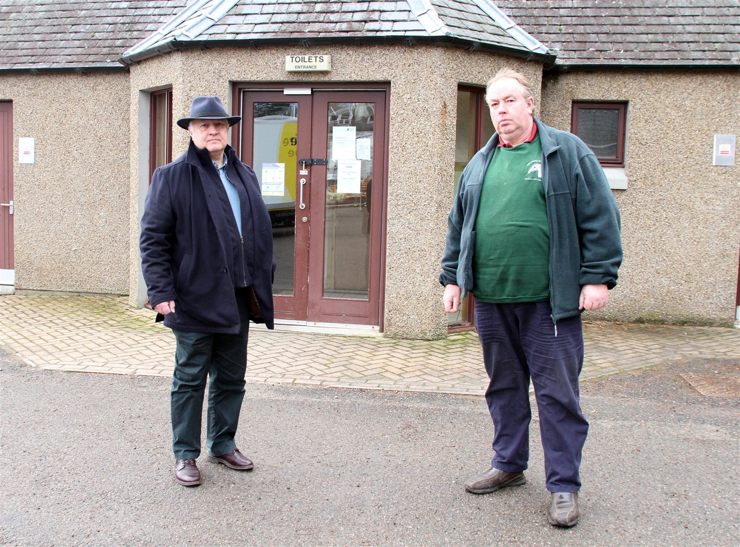 Councillor Bill Lobban (left) and Kingussie Community Council chairman Ruaridh Ormiston at the Ardvonie public conveniences to inspect the damage.