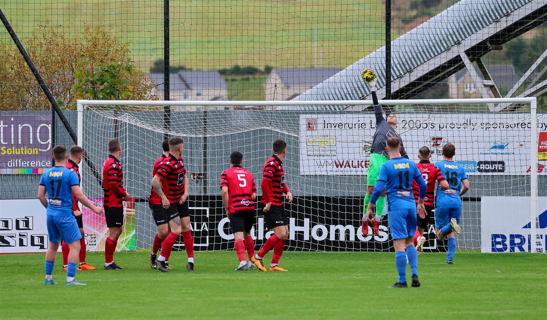 Locos goalkeeper Zak Ellis tips a Kane Davies free kick just over the bar to deny the Jags an equaliser. Kevin Taylor Photography