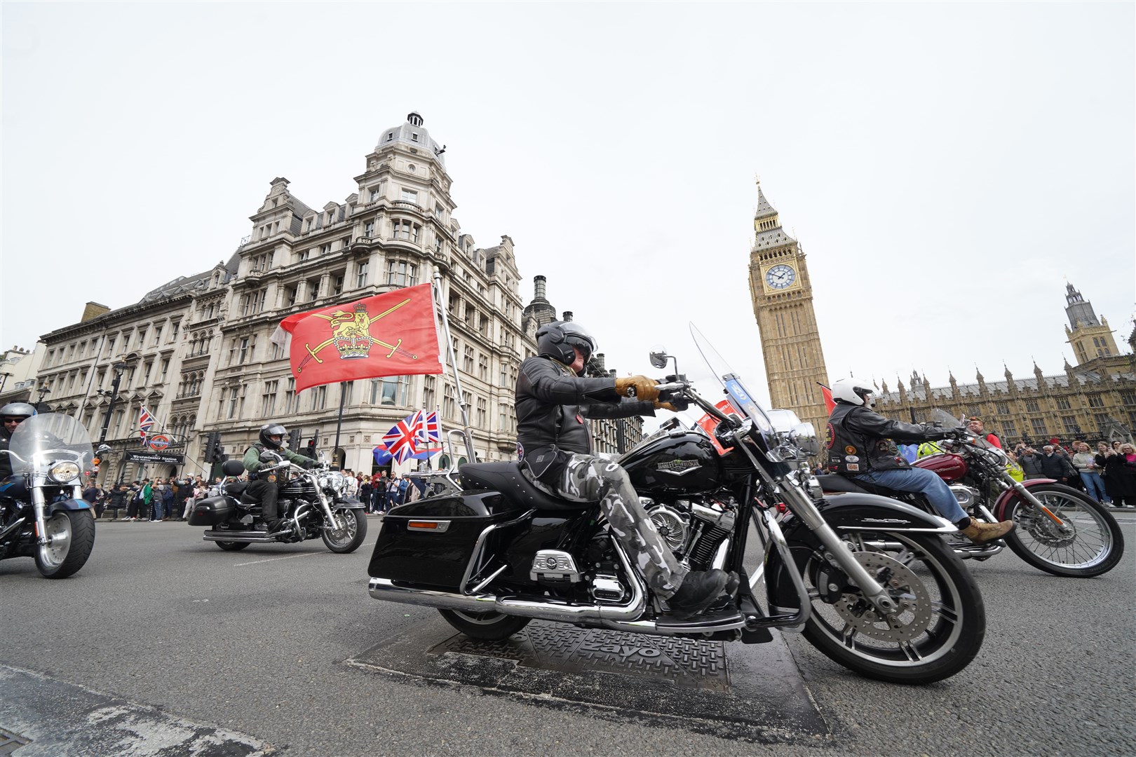 The veterans rode through Westminster into Parliament Square (Lucy North/PA)