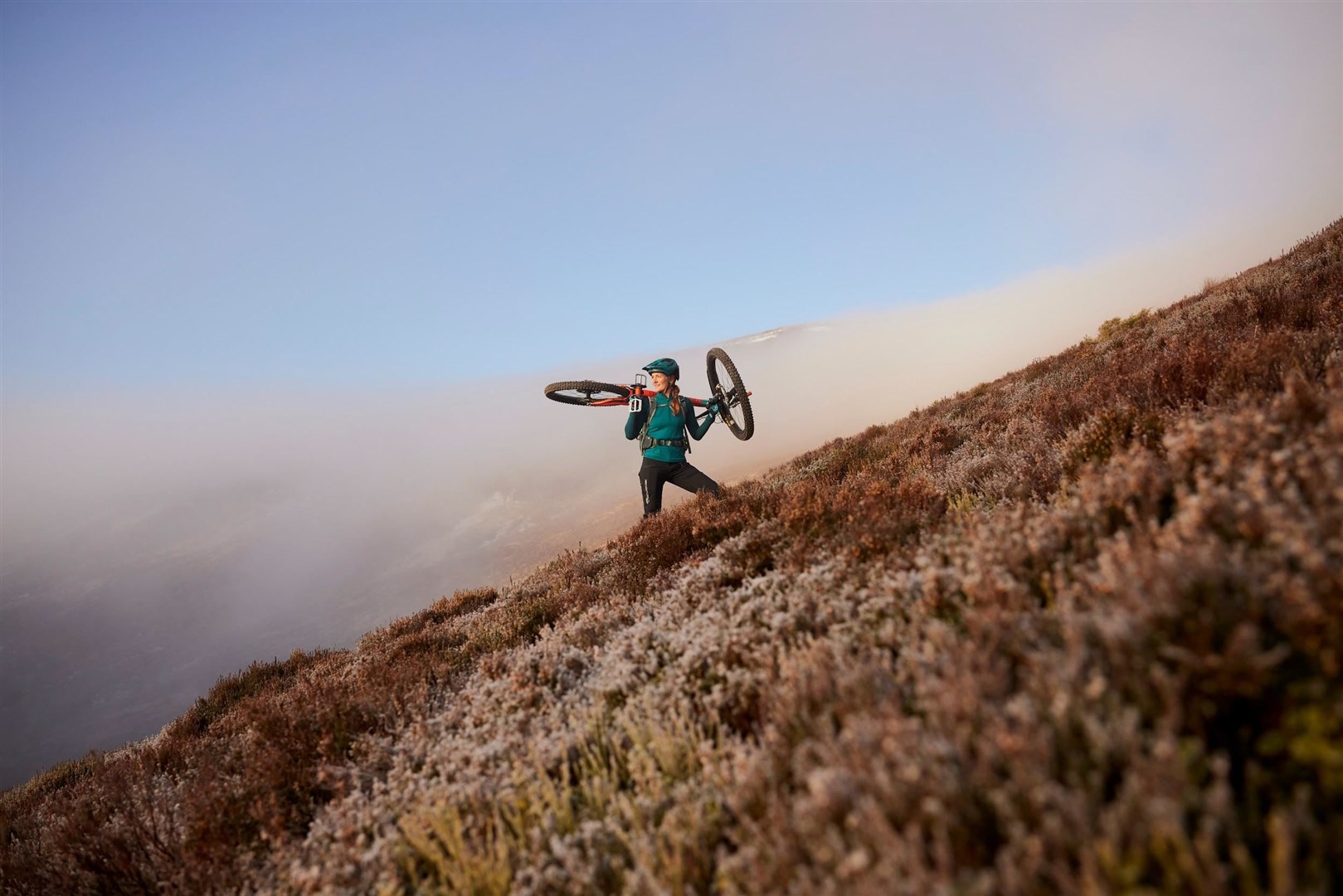 PIGGYBACK: Roles reversed in the Cairngorms, for the hill. Picture: Ed Smith Photography