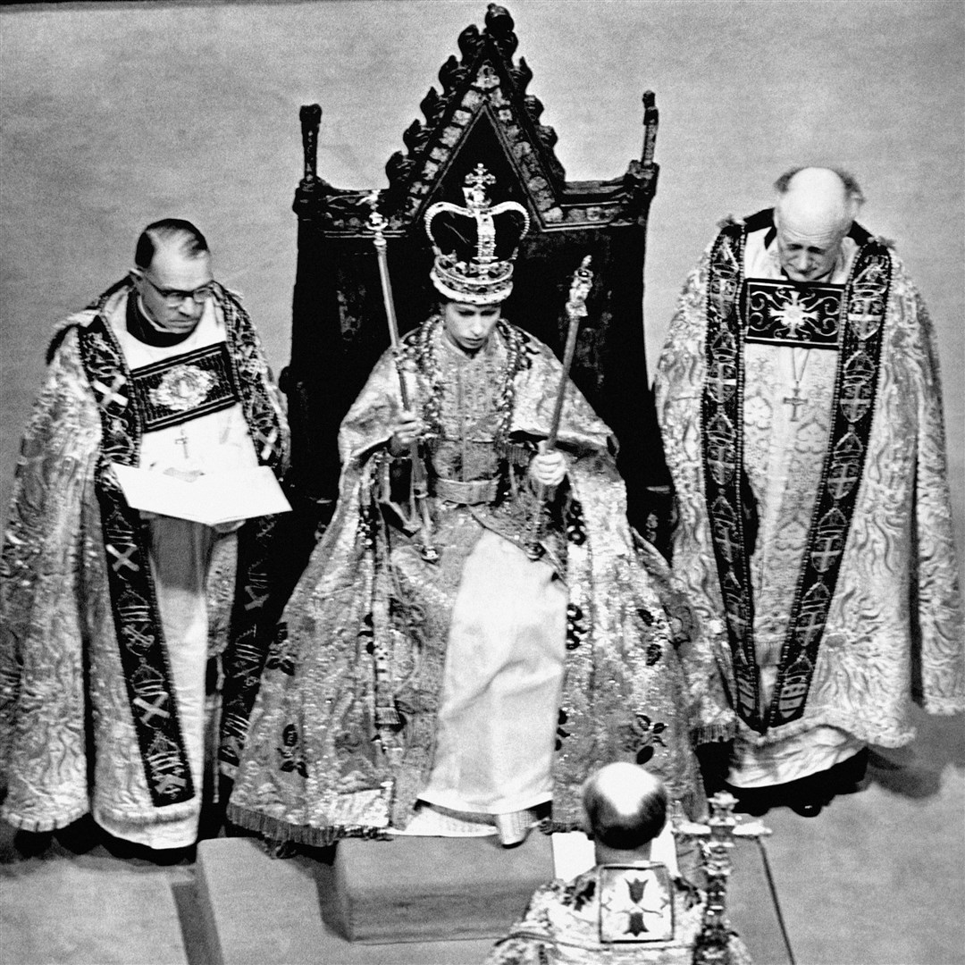 The late Queen during her 1953 coronation (PA)