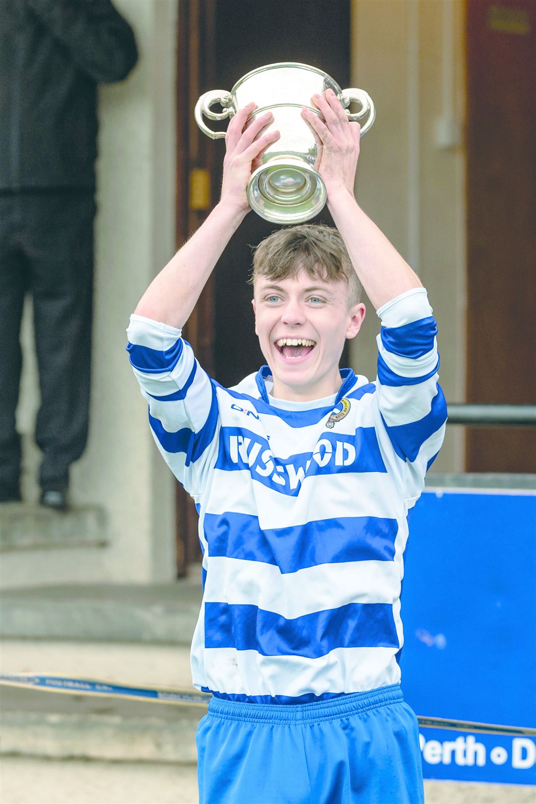 Turning the clock back a year ago Newtonmore captain Sorley Thomson lifts the Sutherland Cup played at Blairbeg Park, Drumnadrochit.