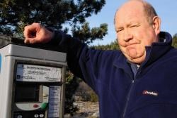 Gordon Chalmers at the new parking meter.
