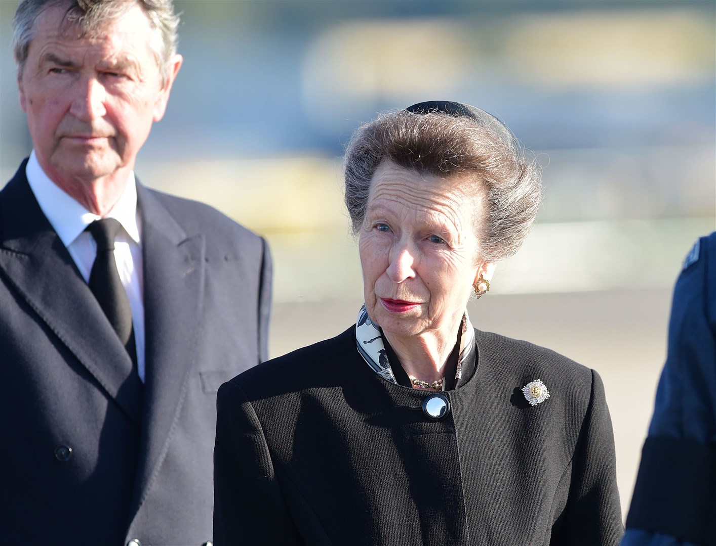 The Princess Royal and Vice Admiral Sir Tim Laurence as the coffin of Queen Elizabeth II is met at Edinburgh Airport (Victoria Stewart/PA)