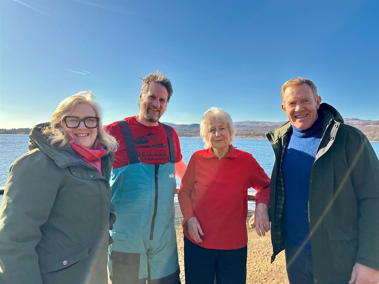 COUNTRY PHILES: Pictured yesterday on the beach at Loch Insh are, from left, presenter Charlotte Smith, Loch Inshers Jonny and Sally Freshwater, and presenter Adam Henson.