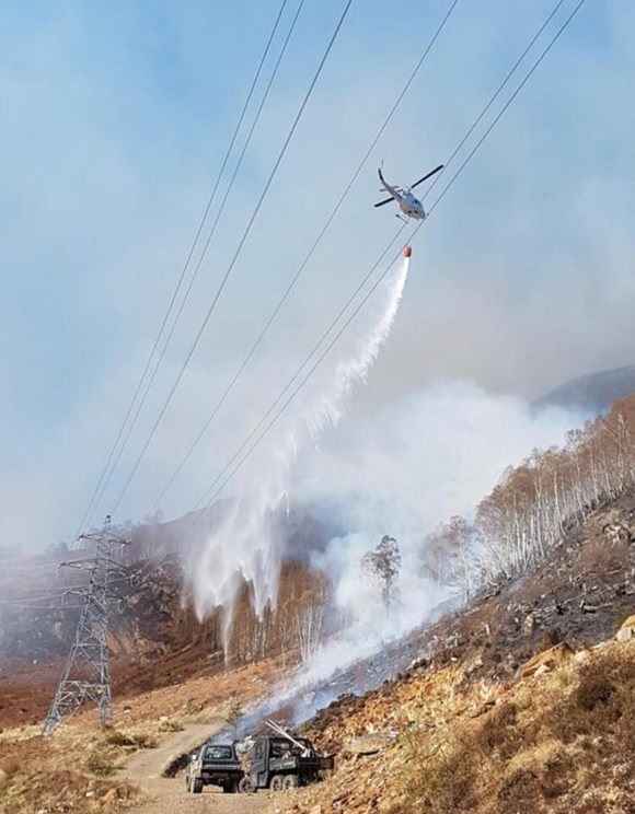 A heli-services picture captures modern fire-fighting methods. At Badenoch, though, it was all ground work for the six different crews