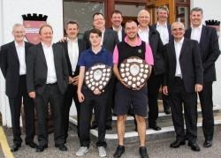 Ian Anderson (centre right), overall scratch winner in the four day open at Grantown Golf Club, alongside section two winner Ian Mackellar and club committee members and players.