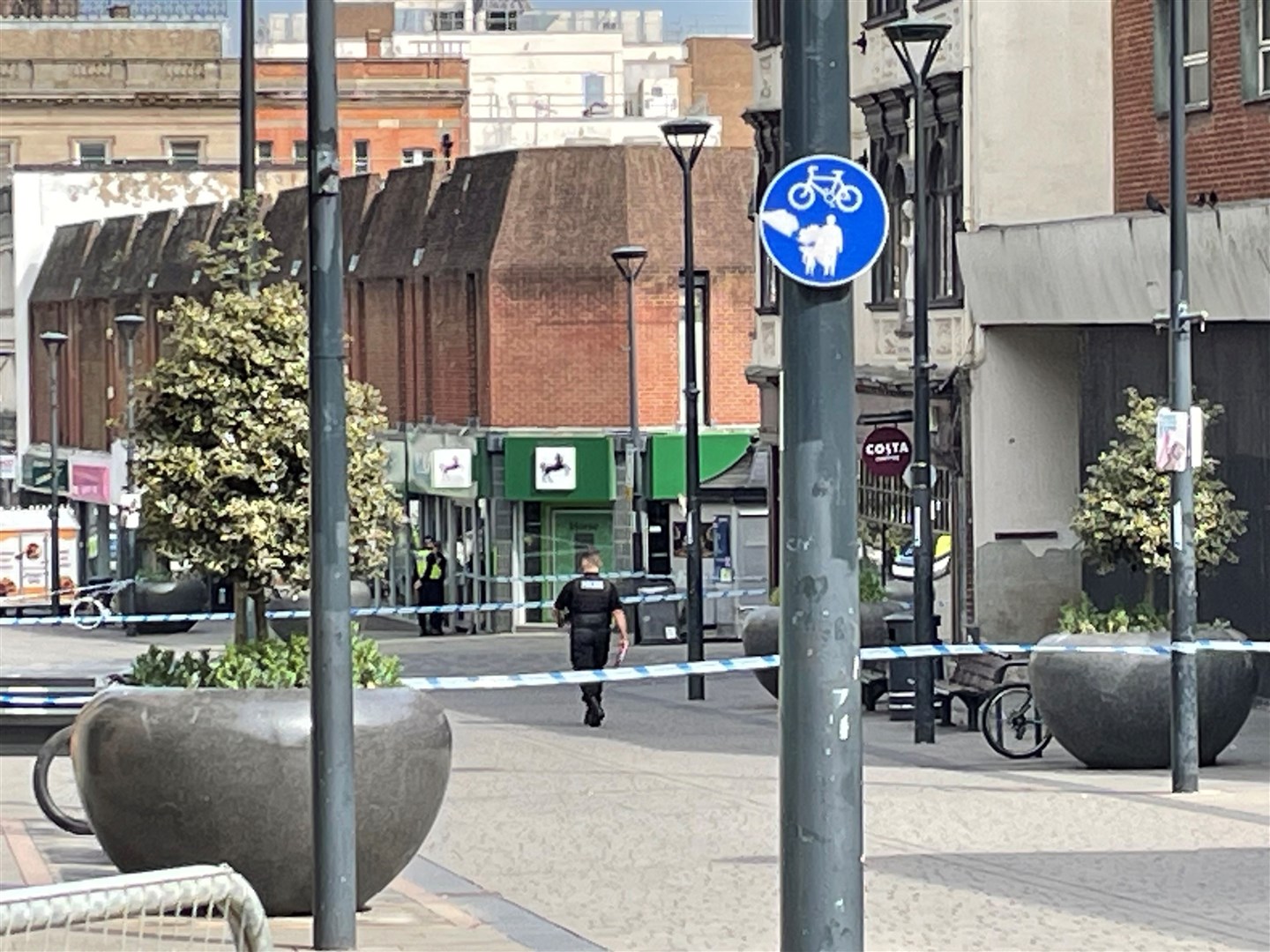 The man in his 30s was attacked inside Lloyds Bank at around 2.35pm on Tuesday and died at the scene. (Matthew Cooper/PA)