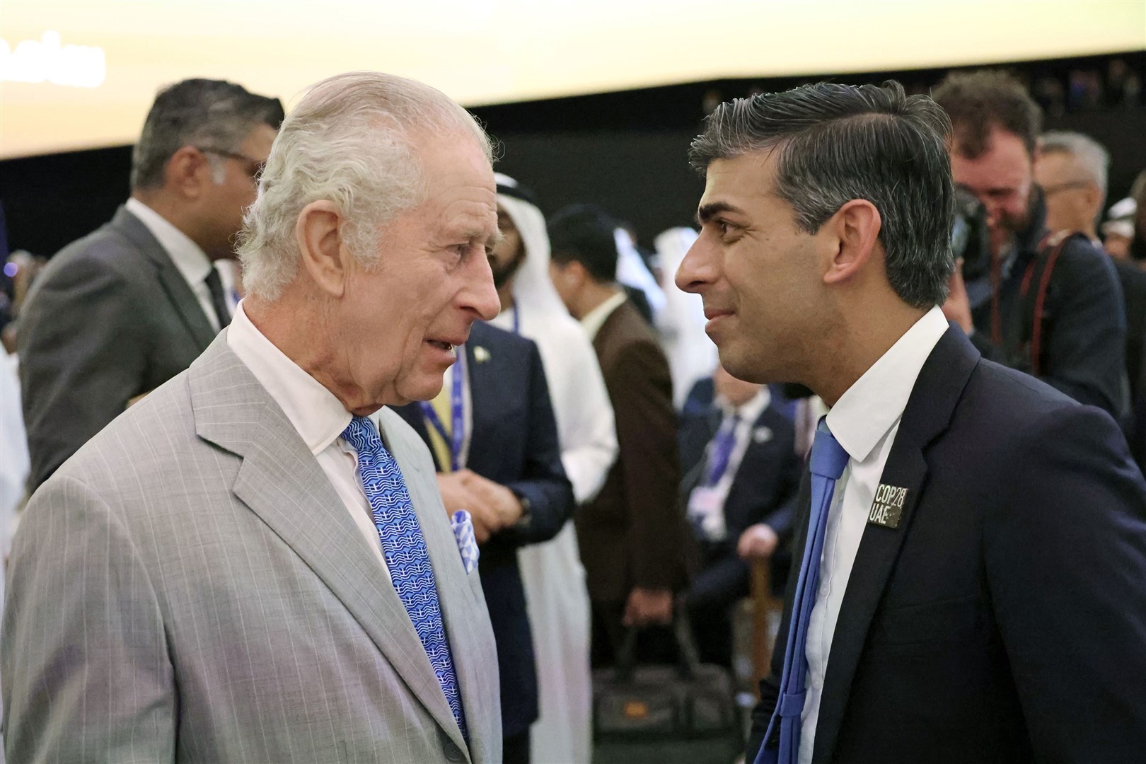 The King speaks with Prime Minister Rishi Sunak as they attend the opening ceremony of the World Climate Action Summit at Cop28 (Chris Jackson/PA)
