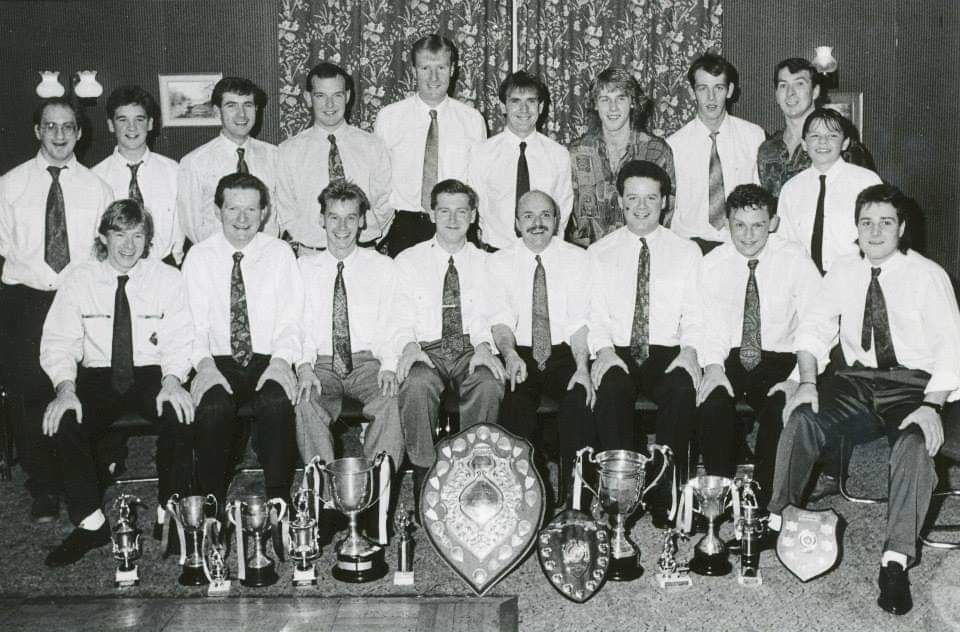 Grantown United pictured with various trophies, including the missing league shield, positioned in the middle.