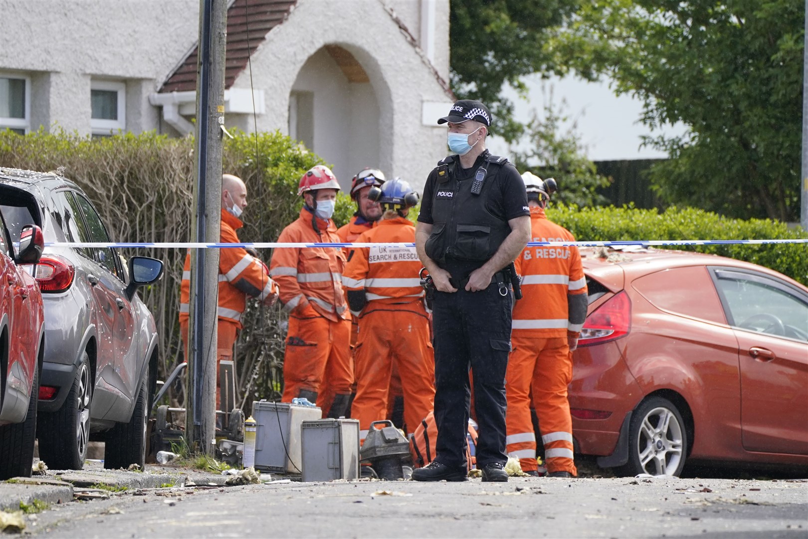 Emergency workers at the scene (Danny Lawson/PA)