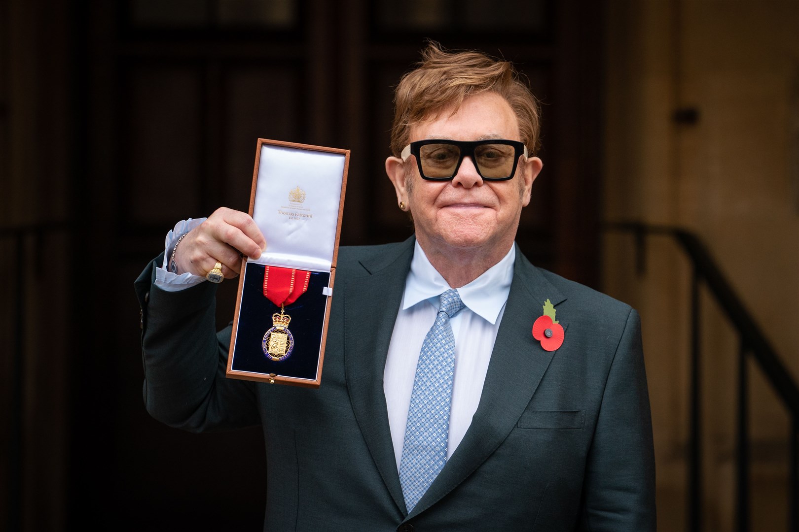 Sir Elton John in 2021 after being invested as a member of the Order of the Companions of Honour for services to music and to charity (Dominic Lipinski/PA)