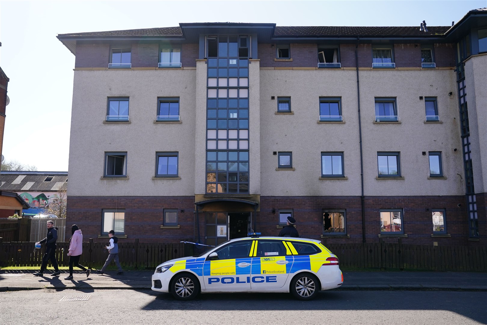 A police car remained at the scene on Monday (Jane Barlow/PA)