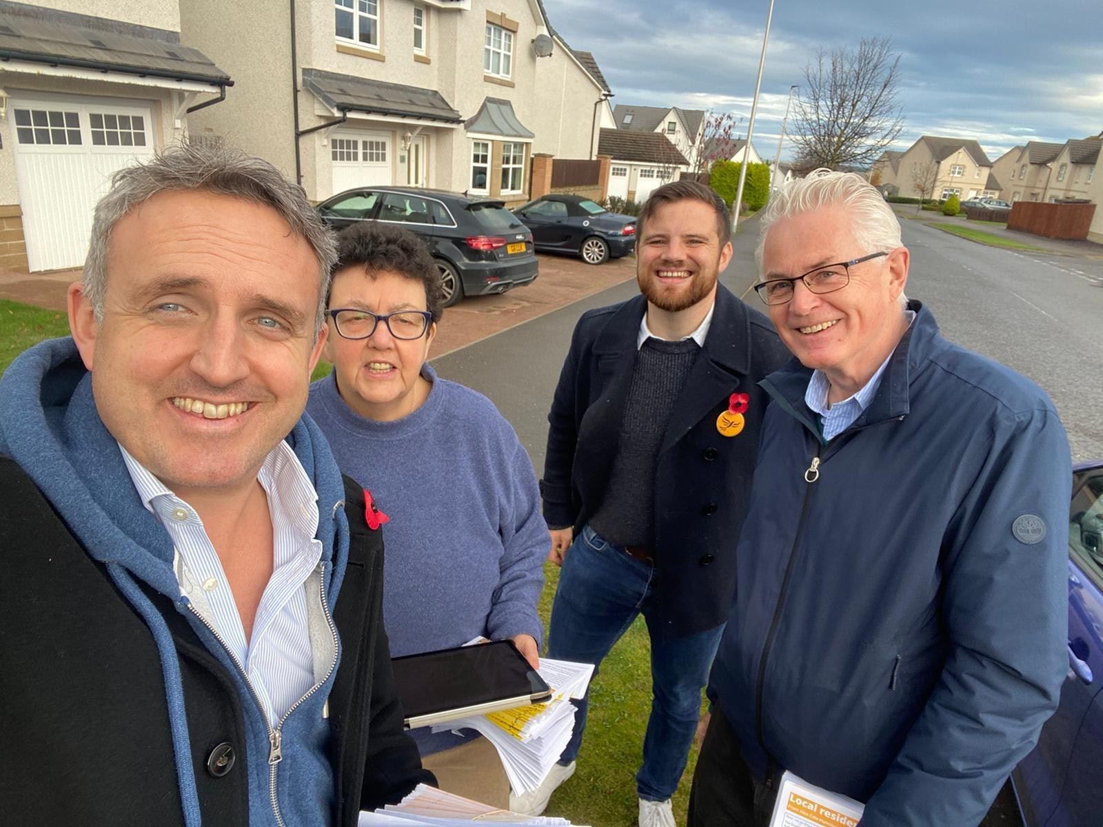 Scottish Liberal Democrat leader Alex Cole-Hamilton (left) on the campaign trail.