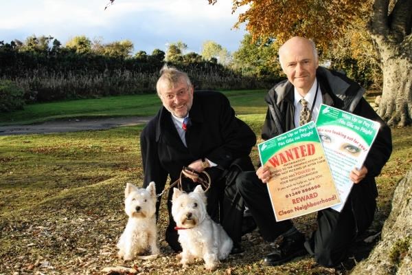 Cllr Phillips with his Westies Tablet and Skirlie join Education and Enforcement Officer James Anderson at the launch of the new campaign
