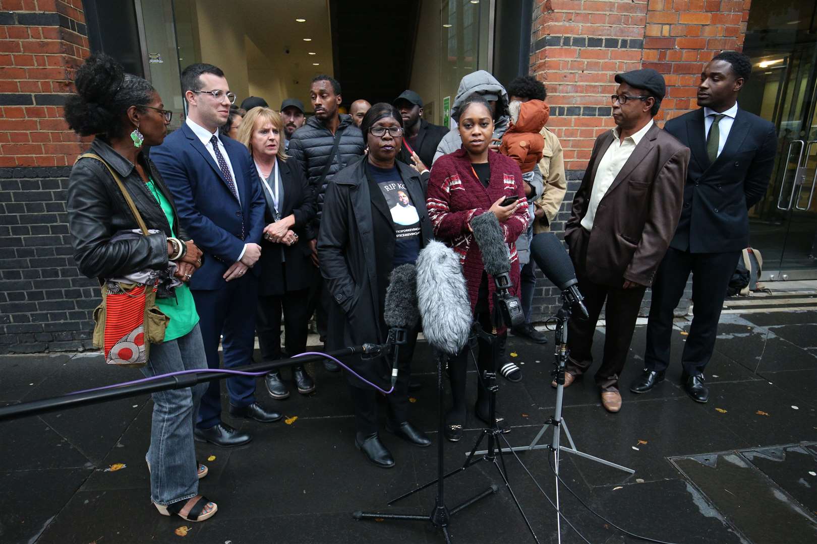 Mr Clarke’s family talked to the media outside Southwark Coroner’s Court (Jonathan Brady/PA)