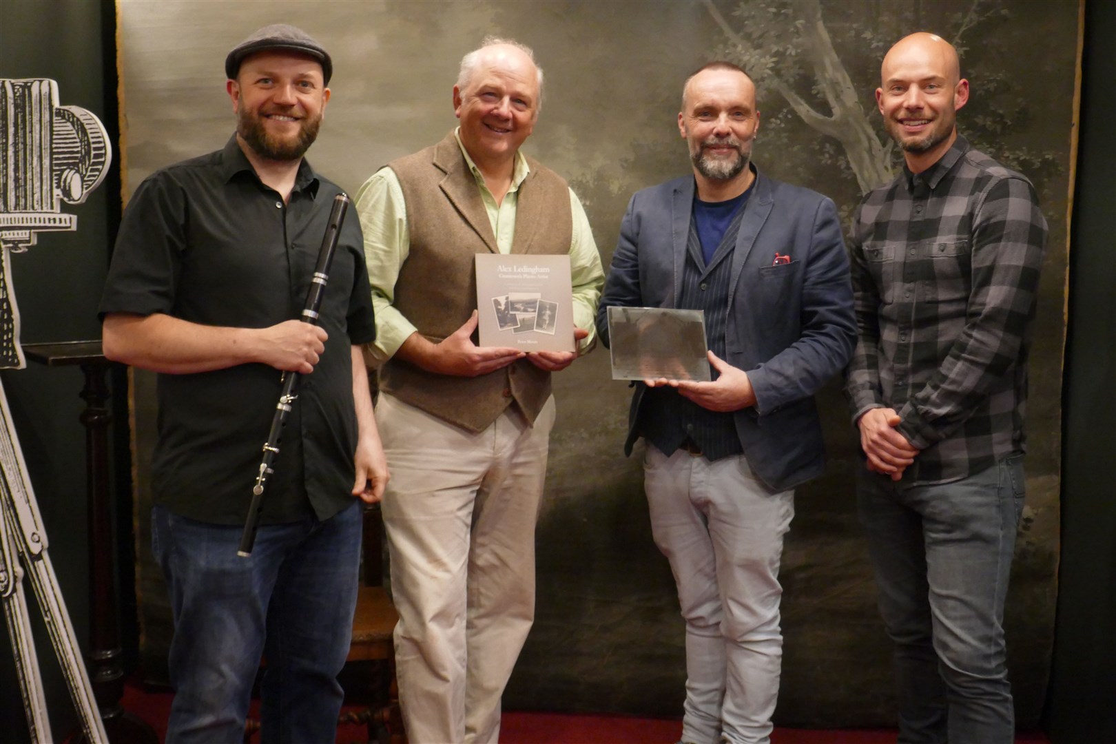 Hamish Napier, Pete Moore, Dan Cottam, Alex Cumming at the opening of the Alex Ledingham exhibition at Grantown Museum, 17 June, 2022