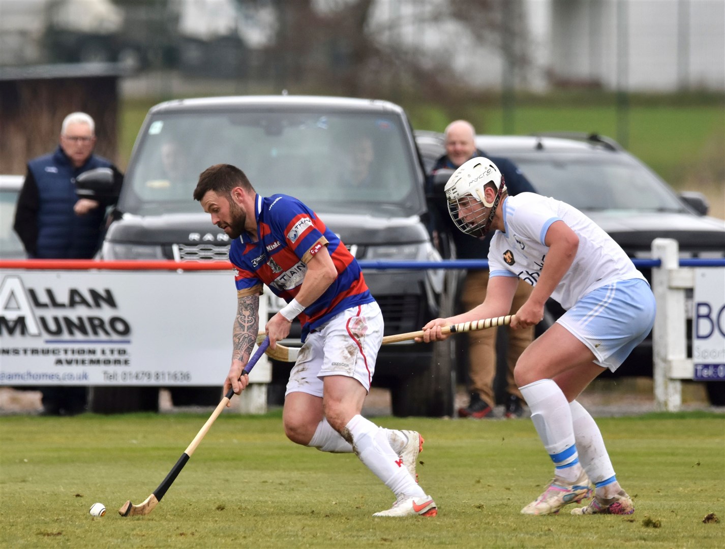Kings skipper Thomas Borthwick gets the ball away from his marker.