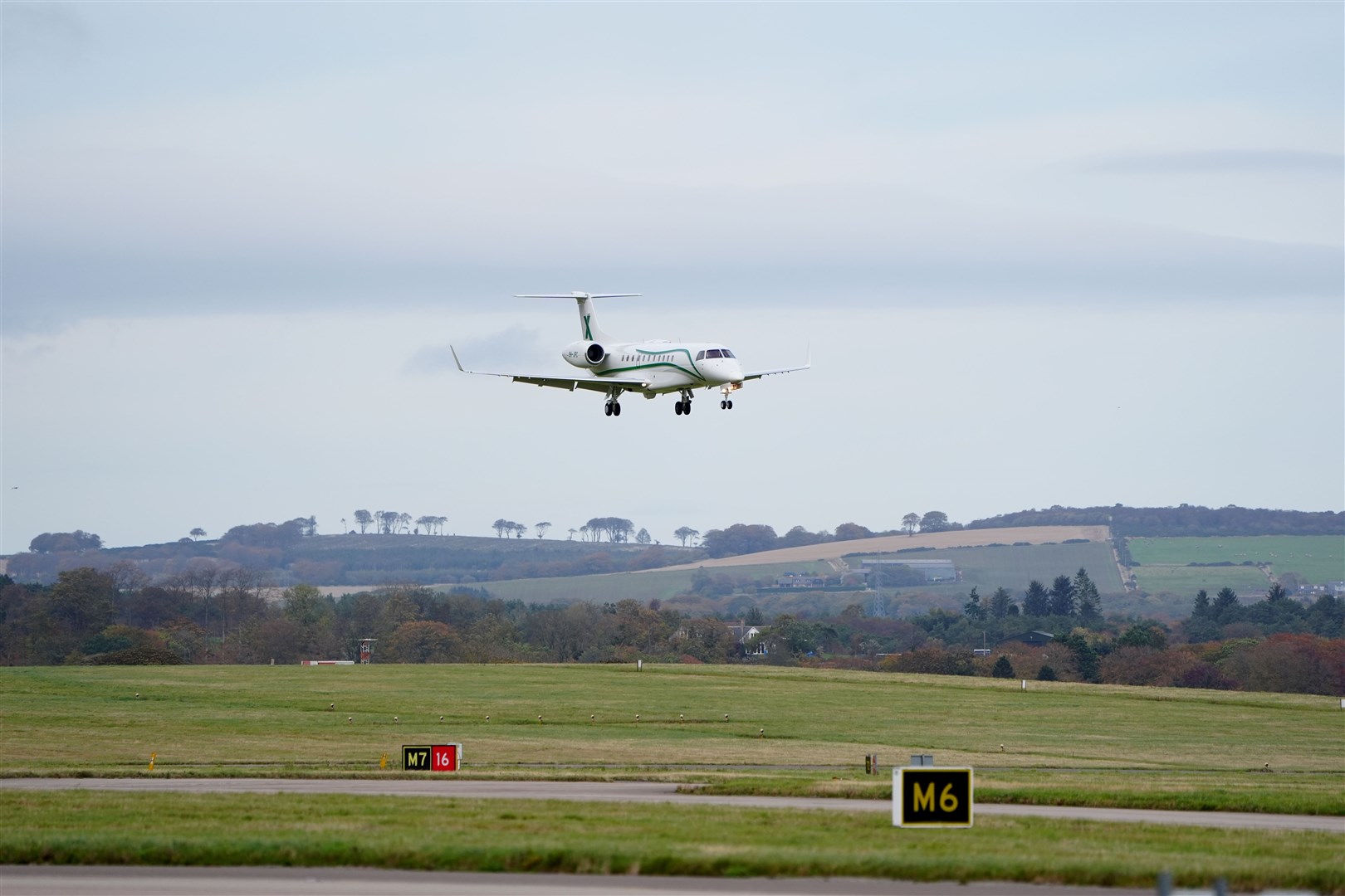 The plane landed just before 2pm on Friday (Jane Barlow/PA)
