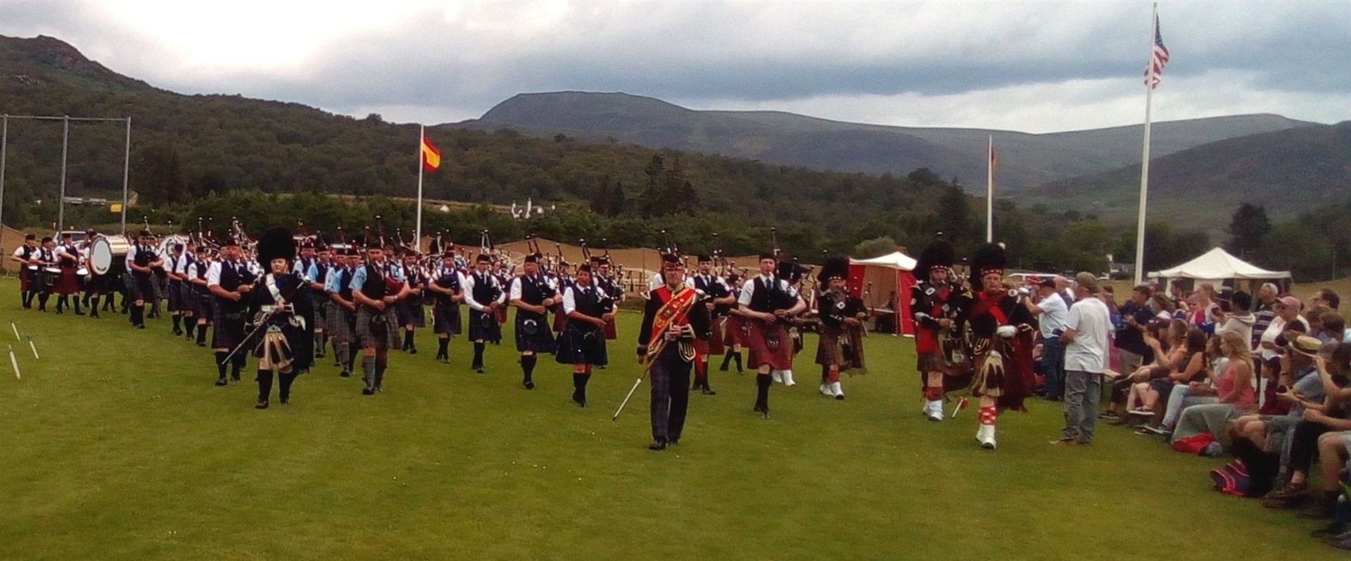 Five pipe bands joined at Newtonmore