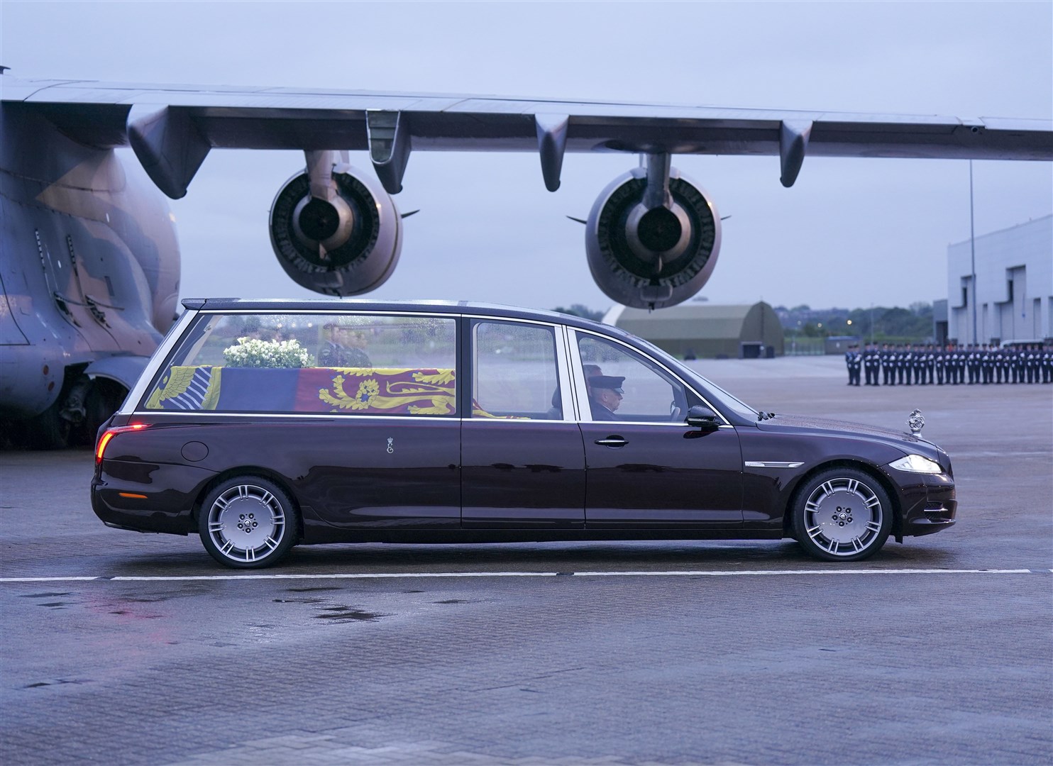The hearse carrying the coffin of Queen Elizabeth II departs RAF Northolt (Arthur Edwards/the Sun/PA)