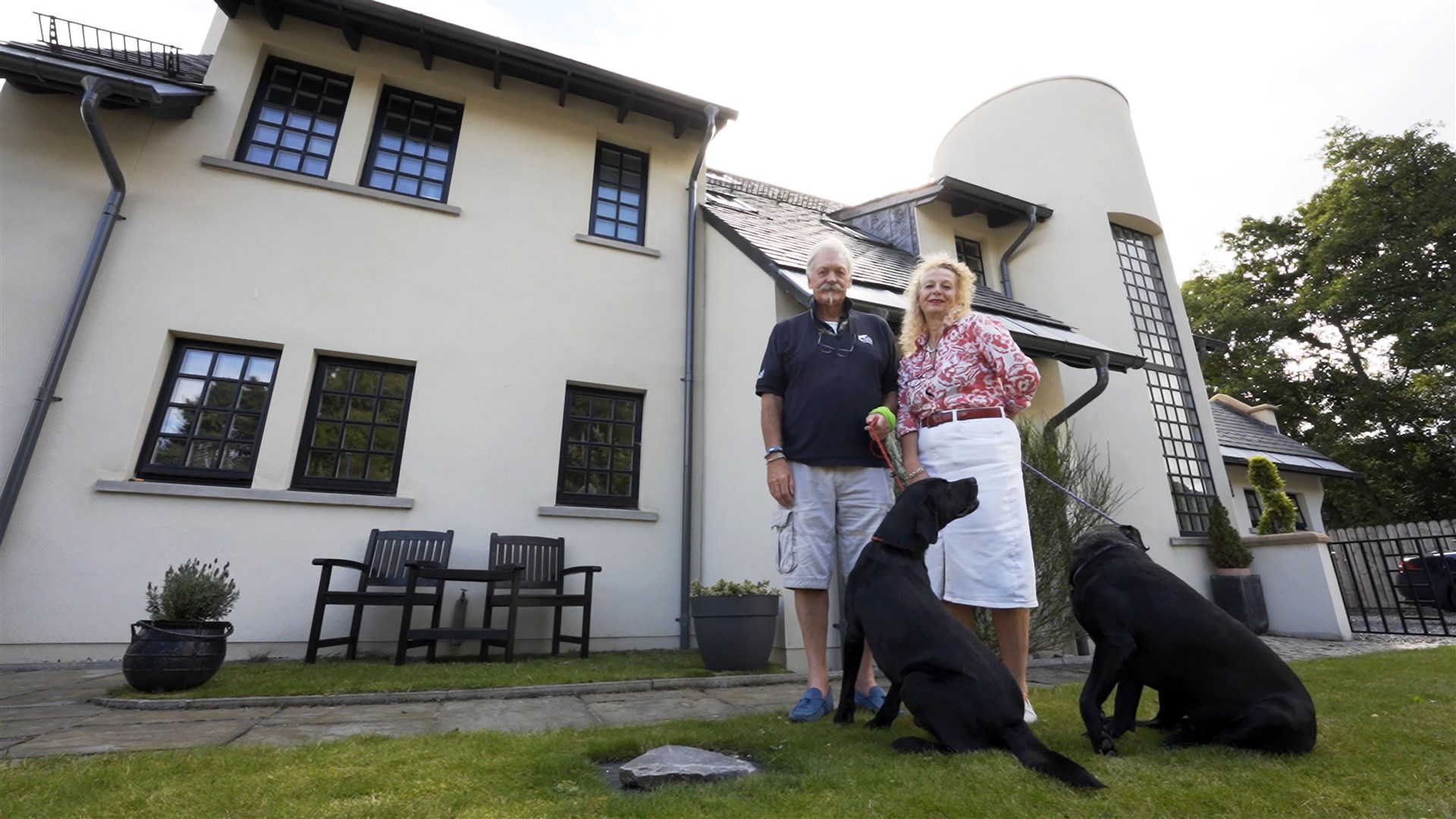 Ian Forrester and Myra Francis outside their stunning home Saltire House in Aviemore.