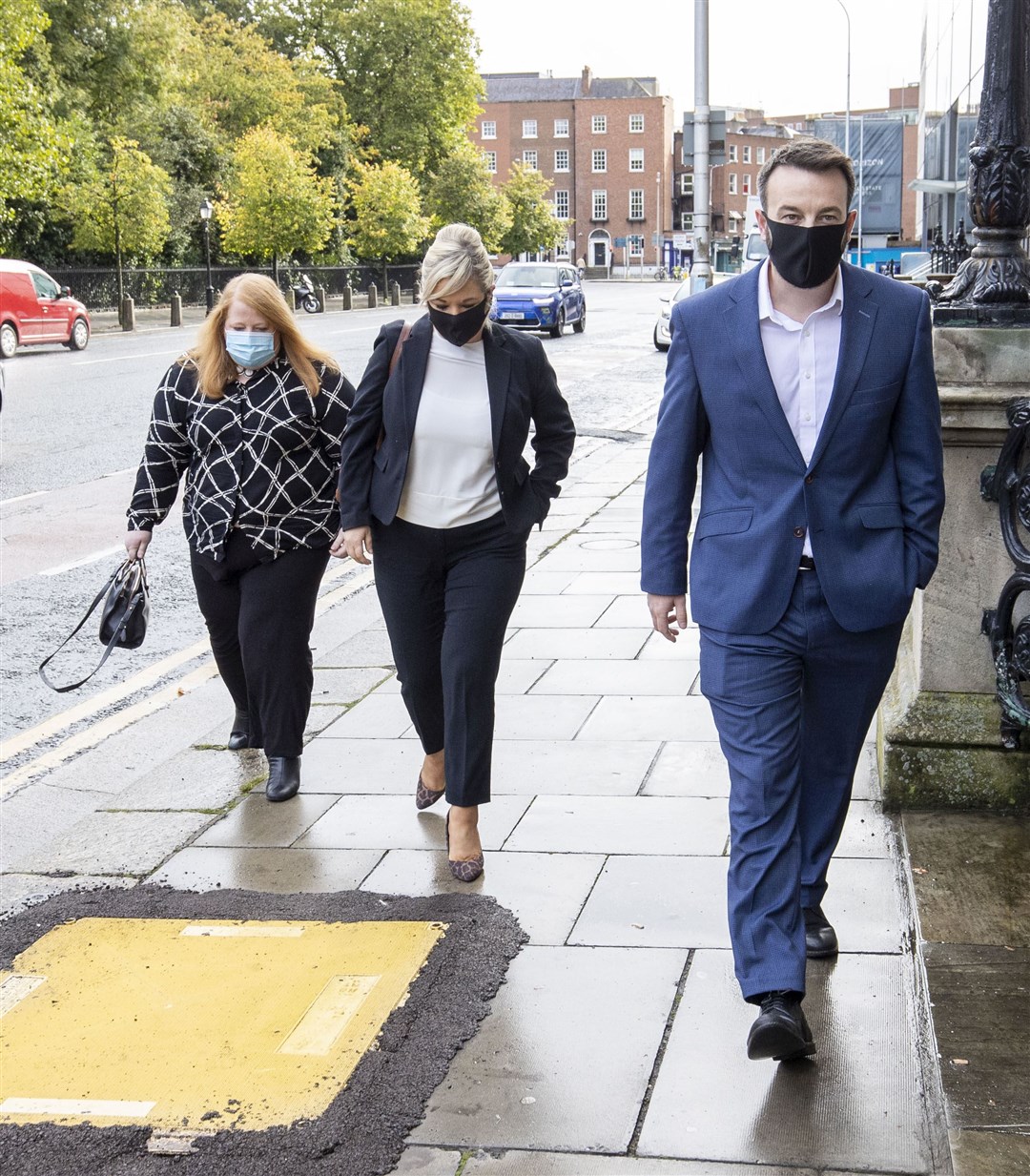 Naomi Long, Michelle O’Neill and Colum Eastwood arrive at Iveagh House in Dublin for the meeting with Simon Coveney (Julien Behal/PA)