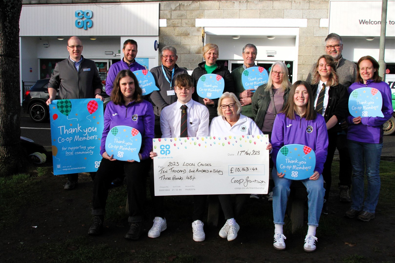 Recipients at the cheques handover, pictured with Co-op officials Graham Shand and Ewan MacGregor.