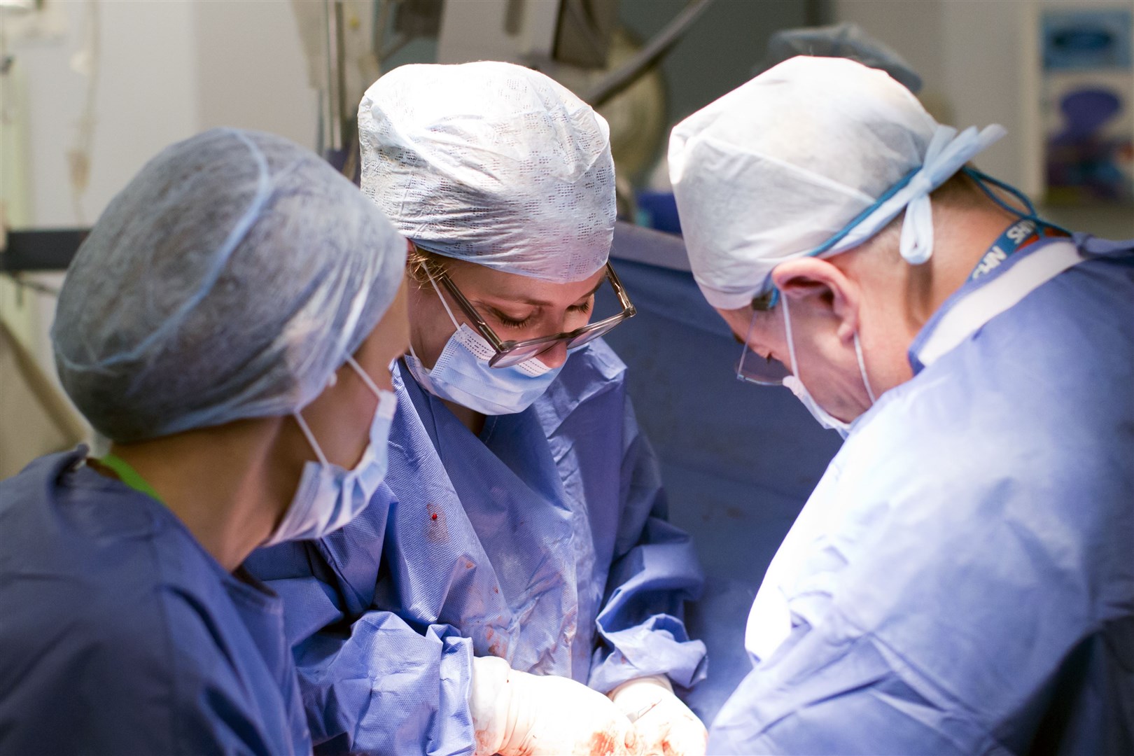 The surgical team at Queen Charlotte’s and Chelsea Hospital at work during Amy’s delivery (Womb Transplant UK/PA)