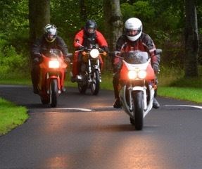 Motorcyclists on a Highland road