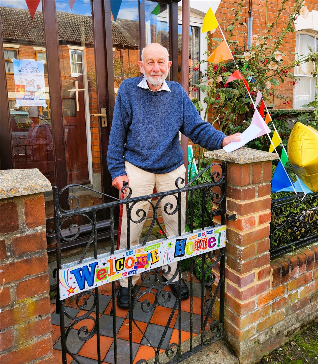 Peter is welcomed home after completing the mammoth trek across the UK.