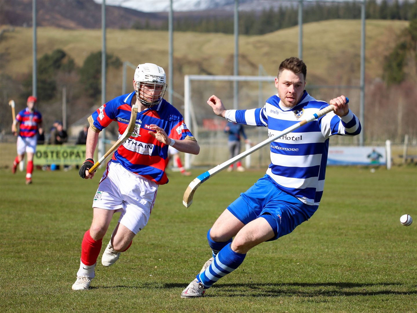 Steve Macdonald (right) in action for Newtonmore.