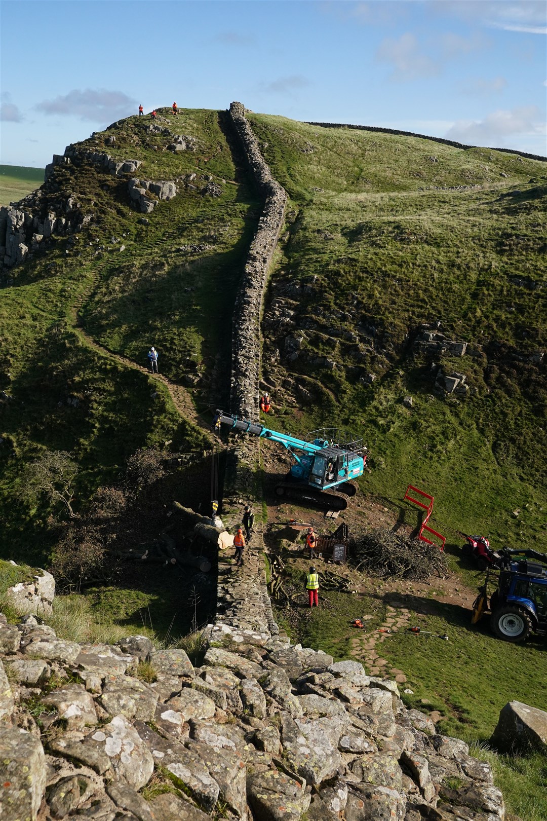 The removal of the felled Sycamore Gap tree, on Hadrian’s Wall in Northumberland (Owen Humphreys/PA)