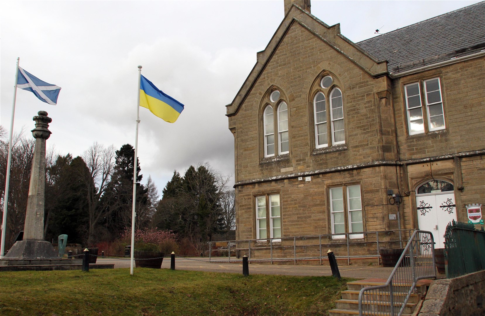 The Ukrainian flag flies side by side with the Saltire in front of the townhouse in Grantown.