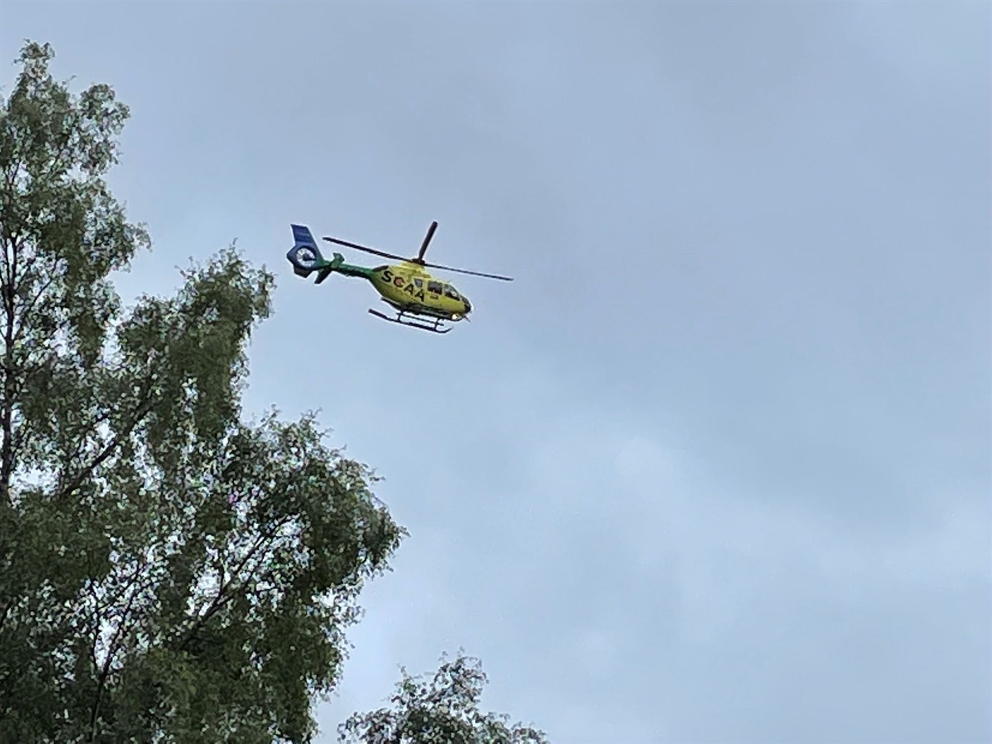 The chairty's air ambulance departs the scene on its way to Raigmore Hospital.