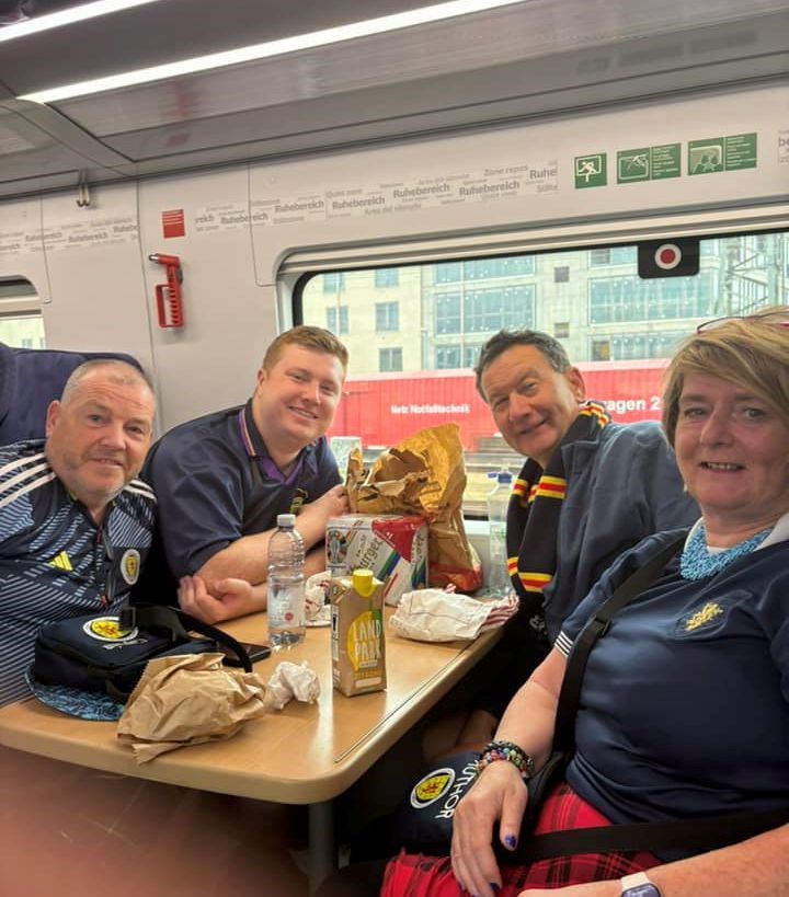 The Campbells on the train to Cologne from Karlsruhe, which was full of Scottish and friendly Swiss fans as it started in Basel.