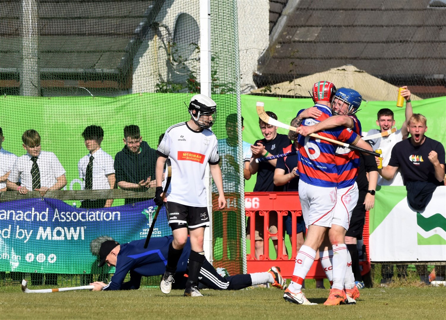 Bremner celebrates his goal with James Falconer (right) but he is banned for this weekend's game after getting his marching orders in the Camanachd Cup Final. Picture: Fiona Young.