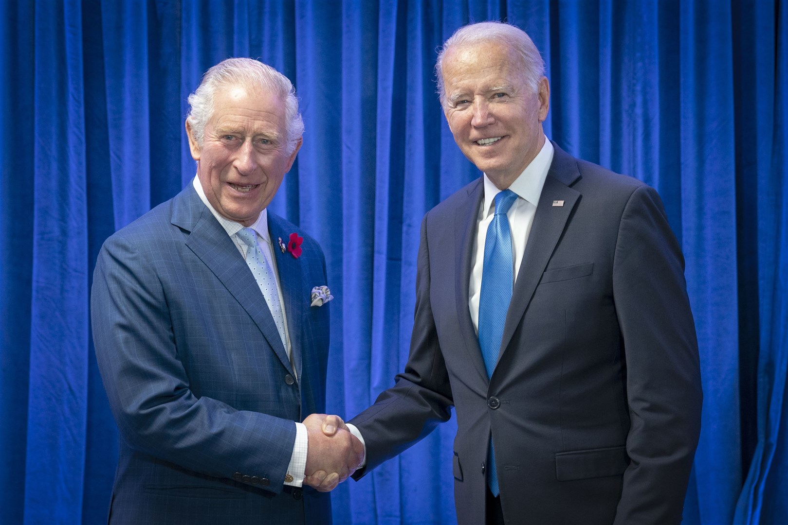The King greets the President of the United States Joe Biden (Jane Barlow/PA)