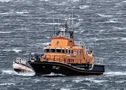 Thurso lifeboat The Taylors escorts a local creel boat back to Scrabster.