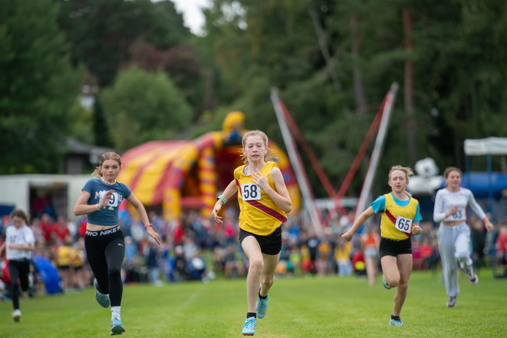 Action from the girls 100m race. Picture: Callum Mackay.