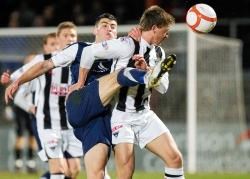 Johnny Flynn hit the last-gasp winner which keeps County in the First Division.