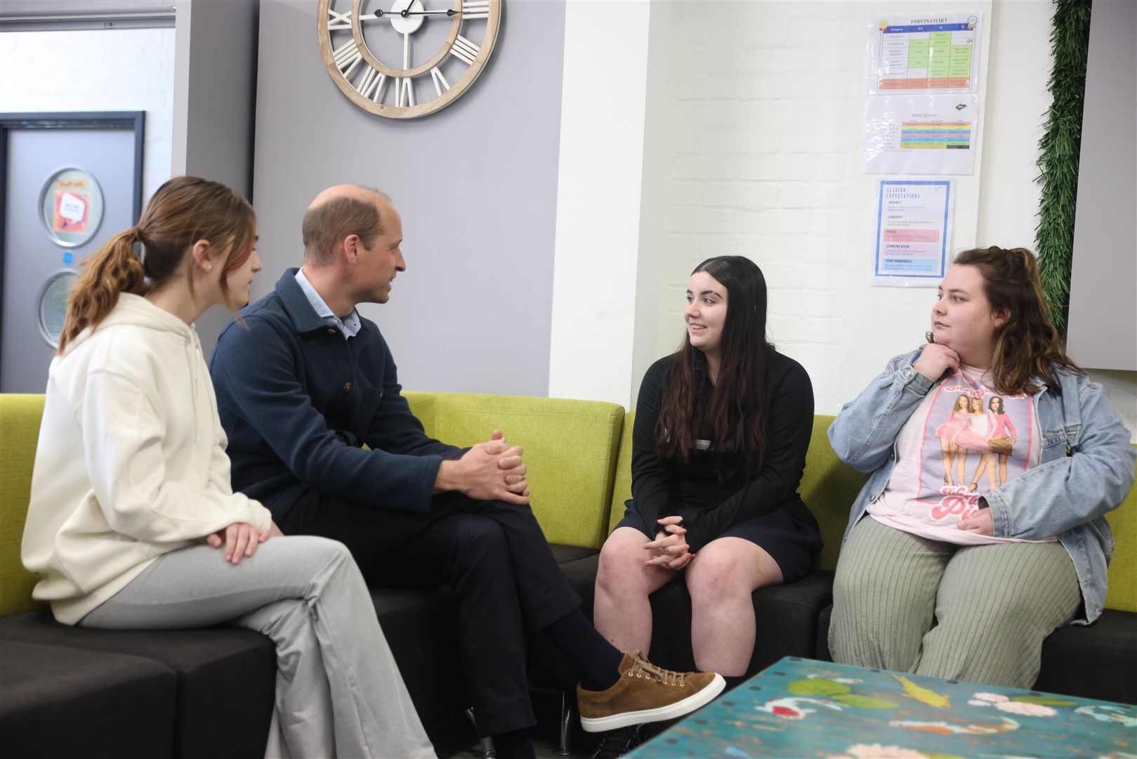 William chatting to some of the young people who use services at the Hanworth Centre Hub (Ian Vogler/Daily Mirror/PA)